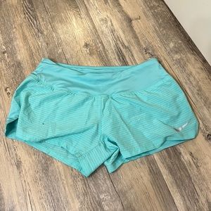Seafoam Nike running shorts